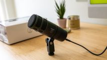 Audio Technica review image showing the microphone on a well lit desk.