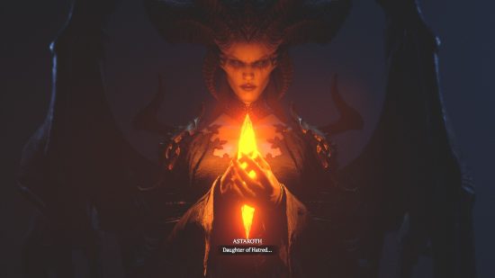 A horned woman, shrouded on darkness is partially lit by the crystal she is holding.