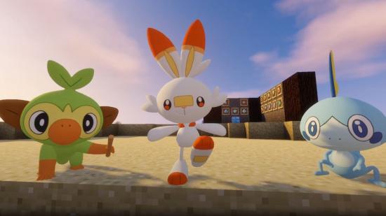 Best Minecraft mods - Grookey, Scorbunny, and Sobble are standing on sand near a wall of materials.